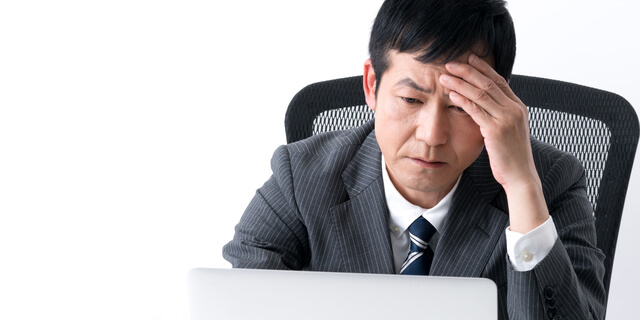 疲れている中年男性