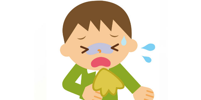 嘔吐する子ども